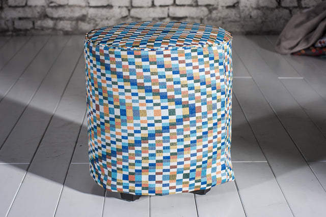 TURKIS-ORANGE KONFETTI-TERN PÅ SORT BARCELONA JACQUARD DEKORATIONSSTOF – KONFETTI-TERN