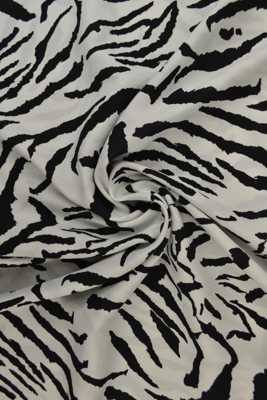 Viskose stof med abstrakt zebraprint – sort & grå, metervare til erhverv (billede 1 af 9)