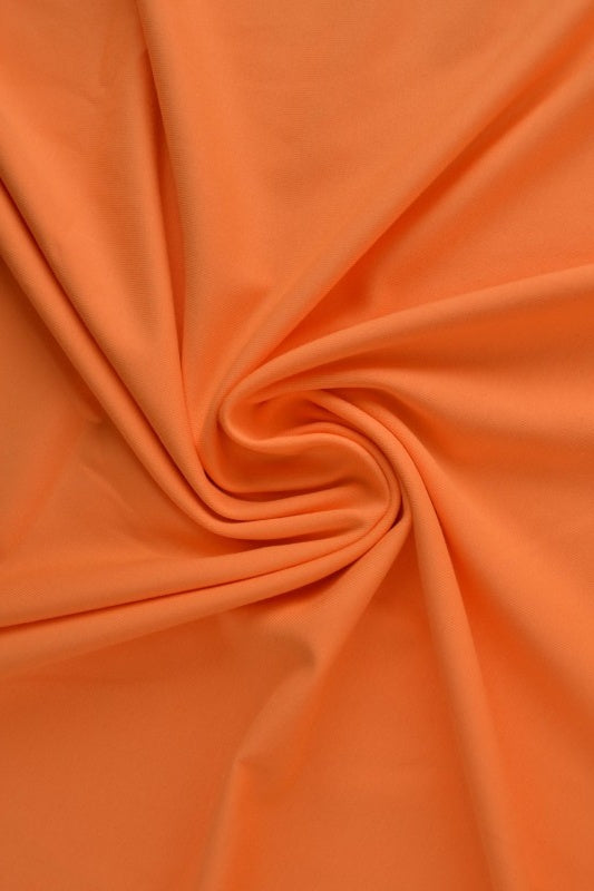 Orange bomuldsjersey – naturlig, åndbar & strækbar, metervare til erhverv (billede 1 af 8)