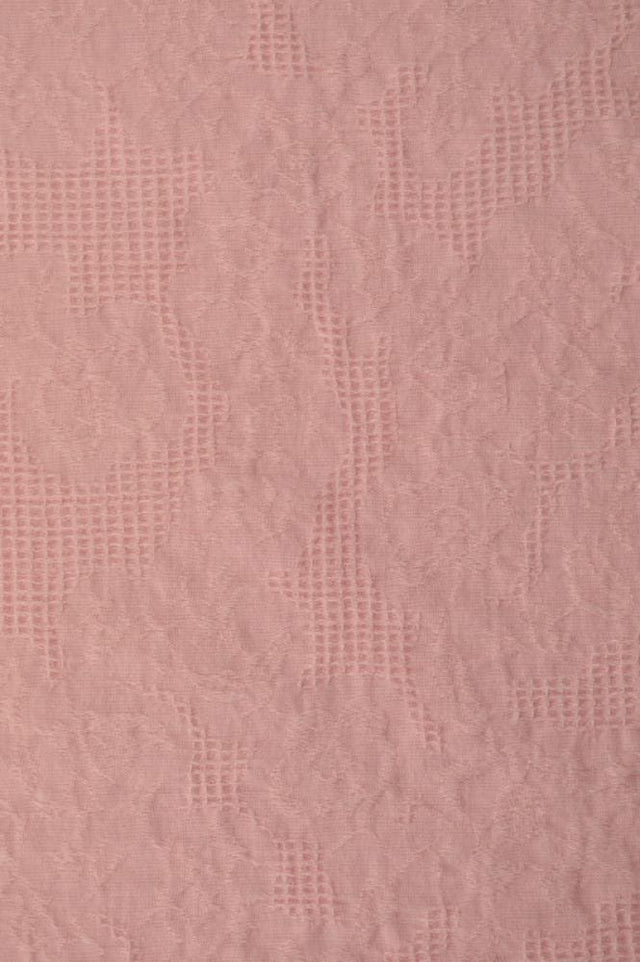 Lyserød bomulds jacquard - vaffelstruktur med blomstermotiv, metervare til erhverv (billede 3 af 5)