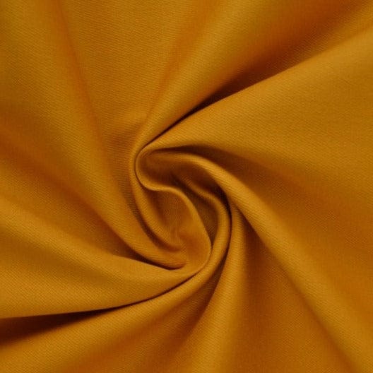 Okkergul bomuldstwill med stræk – diagonal twill & formfast komfort, metervare til erhverv (billede 1 af 7)