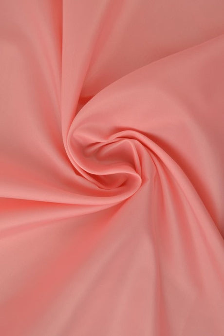 Laksefarvet polyester foer – glat, let & let glans, metervare til erhverv (billede 1 af 5)