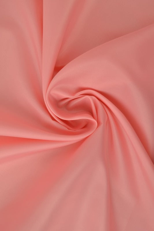 Laksefarvet polyester foer – glat, let & let glans, metervare til erhverv (billede 1 af 5)