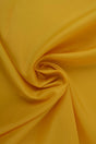 Sennepsgul polyester foer – glat, let & let glans, metervare til erhverv (billede 1 af 5)