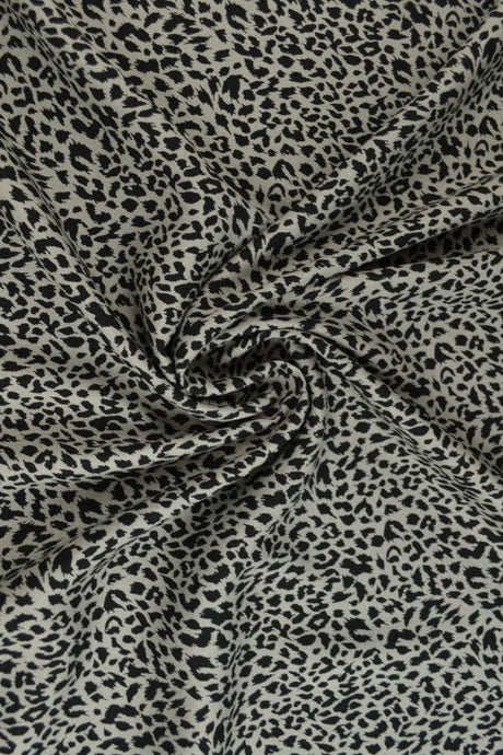 Viskose stof med mini leopardprint – grå & sort, metervare til erhverv (billede 1 af 9)
