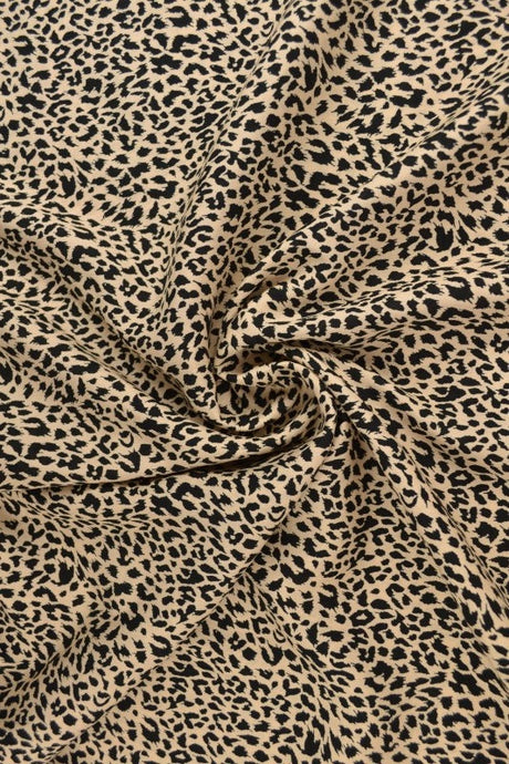 Viskose stof med mini leopardprint – beige & sort, metervare til erhverv (billede 1 af 9)